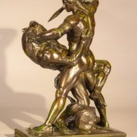 Alt text: Bronze sculpture of Theseus fighting a minotaur