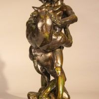 Alt text: Bronze sculpture of Theseus fighting a minotaur