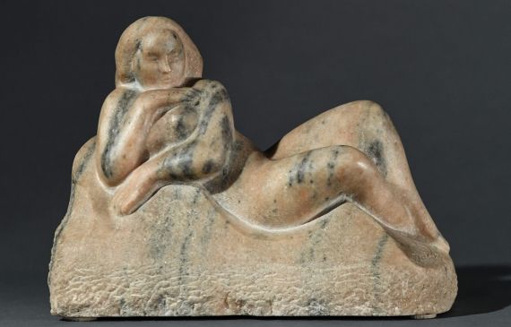 Marble carving of a reclining nude woman