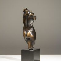 Alt text: Bronze sculpture of a twisting female torso