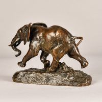 Alt text: Bronze sculpture of a running elephant