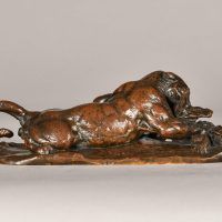 Alt text: Bronze sculpture of a Jaguar devouring a crocodile