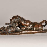 Alt text: Bronze sculpture of a Jaguar devouring a crocodile