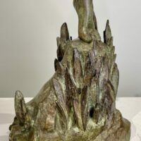 Alt text: Bronze sculpture base