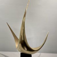 Alt text: Abstract metal sculpture