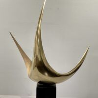 Alt text: Abstract metal sculpture