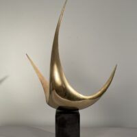 Alt text: Abstract metal sculpture