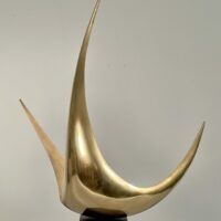 Alt text: Abstract metal sculpture