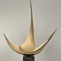 Alt text: Abstract metal sculpture