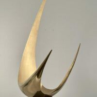 Alt text: Abstract metal sculpture