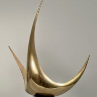 Alt text: Abstract metal sculpture