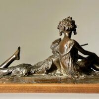 Alt text: Bronze sculpture of two people