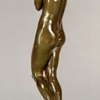 Alt text: Bronze sculpture of a nude woman standing and cradling grapes over her shoulder and into her chest, angled view