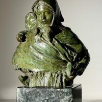 Alt text: Bronze sculpture of woman with child on her back