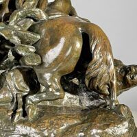 Alt text: Bronze sculpture of a Horseman Hunting Boars