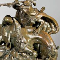 Alt text: Bronze sculpture of a Horseman Hunting Boars