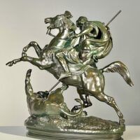 Alt text: Bronze sculpture of a horseman killing a lion