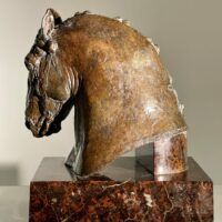 Alt text: Bronze sculpture of a horse's head