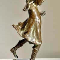 Alt text: Bronze sculpture of a girl roller skating on one foot