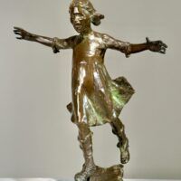 Alt text: Bronze sculpture of a girl roller skating on one foot