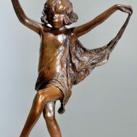 Alt text: Bronze sculpture of a young girl