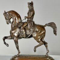 Alt text: Bronze sculpture of Napoleon on horseback