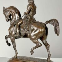 Alt text: Bronze sculpture of Napoleon on horseback