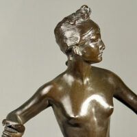 Alt text: Bronze sculpture of the Goddess Diana, detail
