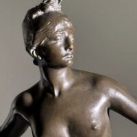 Alt text: Bronze sculpture of the Goddess Diana, detail
