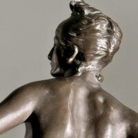Alt text: Bronze sculpture of the Goddess Diana, detail