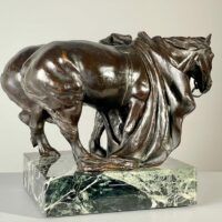 Alt text: Bronze sculpture of two horses