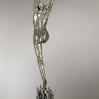 Alt text: Bronze sculpture of a standing woman