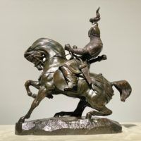 Alt text: Bronze sculpture of a Tartar warrior on horseback