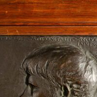 Alt text: Bronze relief sculpture, detail