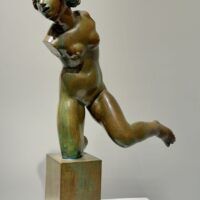 Alt text: Bronze sculpture of a fragmented nude woman