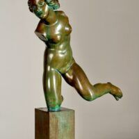 Alt text: Bronze sculpture of a fragmented nude woman