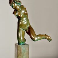 Alt text: Bronze sculpture of a fragmented nude woman