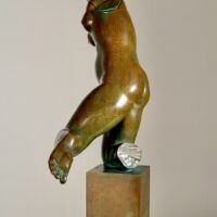 Alt text: Bronze sculpture of a fragmented nude woman