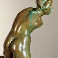 Alt text: Bronze sculpture of a fragmented nude woman