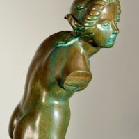 Alt text: Bronze sculpture of a fragmented nude woman
