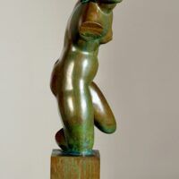 Alt text: Bronze sculpture of a fragmented nude woman