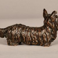 Alt text: Bronze sculpture of a Scottish terrier