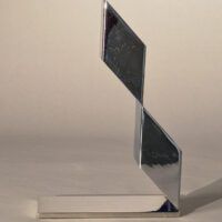 Alt text: Geometric metal sculpture