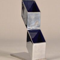 Alt text: Geometric metal sculpture