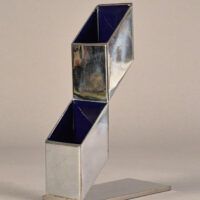 Alt text: Geometric metal sculpture