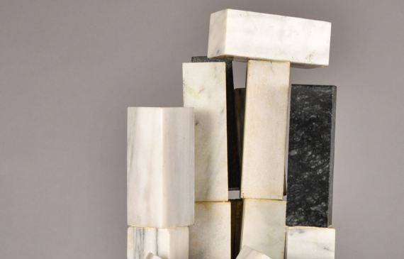 Alt text: Assemblage sculpture composed of different rectangular marble blocks