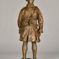 Alt text: Bronze sculpture of a standing soldier