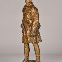 Bronze sculpture of a Canadian officer, angled view