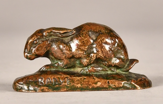 Alt text: Bronze sculpture of a rabbit with ears back