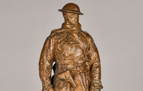 Bronze sculpture of a Canadian officer, angled view
